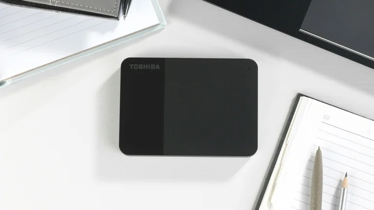 Toshiba Canvio Ready hard drive sat on a desktop