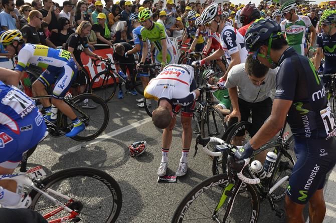 Jurgen Van den Broeck collects himself after the crash