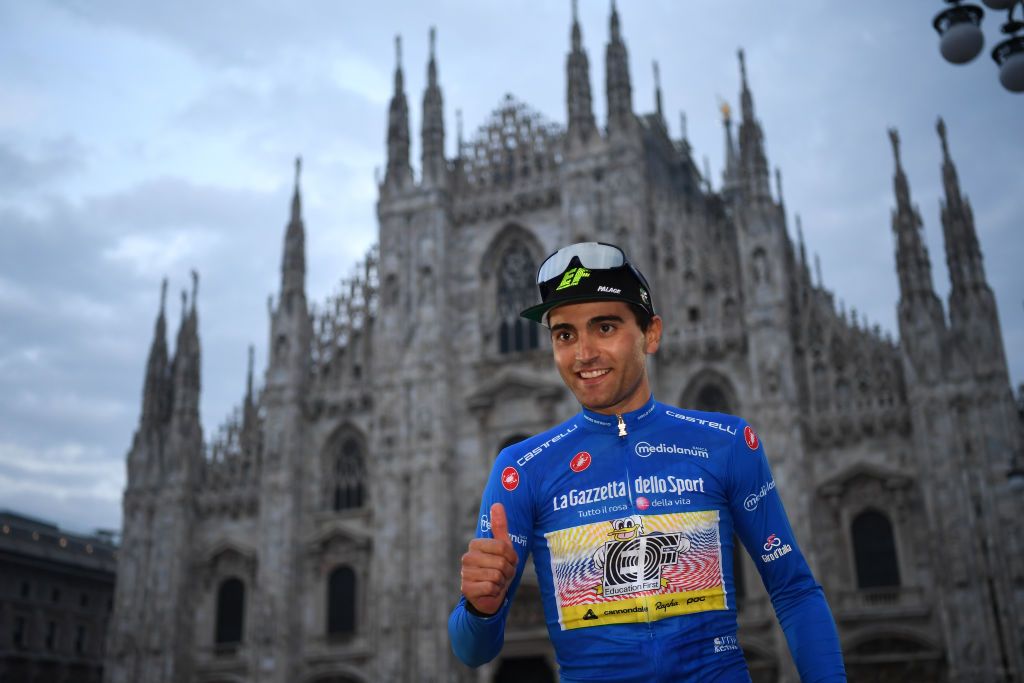 MILANO ITALY OCTOBER 25 Podium Ruben Guerreiro of Portugal and Team EF Pro Cycling Blue Mountain Jersey Celebration Duomo di Milano Milan Cathedral during the 103rd Giro dItalia 2020 Stage 21 a 157km Individual time trial from Cernusco sul Naviglio to Milano ITT girodiitalia Giro on October 25 2020 in Milano Italy Photo by Tim de WaeleGetty Images