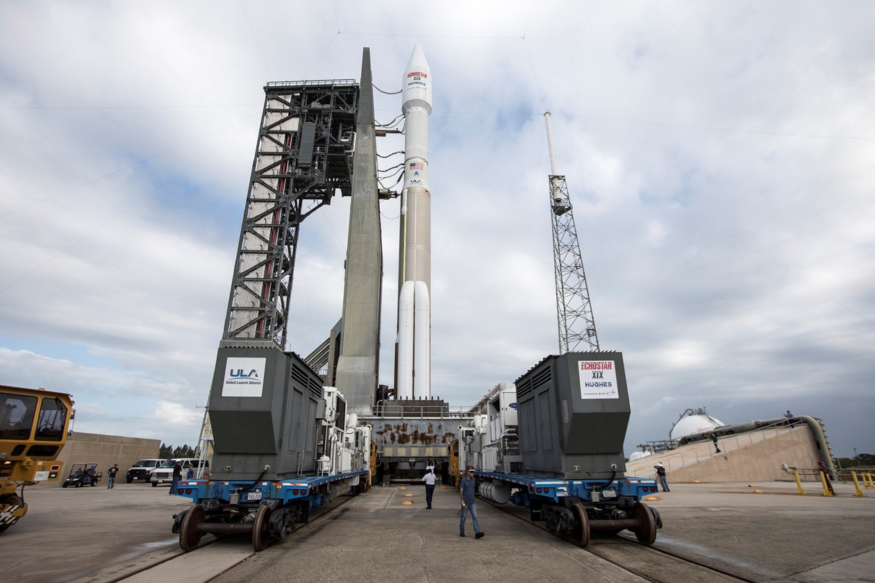  The United Launch Alliance Atlas V rocket carrying the EchoStar 19 satellite is rolled out to the launchpad at Florida&#039;s Cape Canaveral Air Force Station ahead of its Dec. 18, 2016 launch into orbit. 