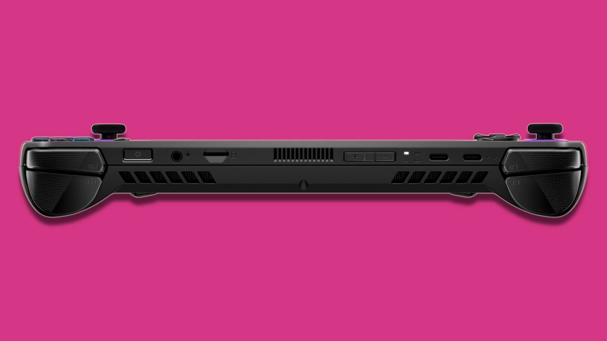 black PC gaming handheld against pink background