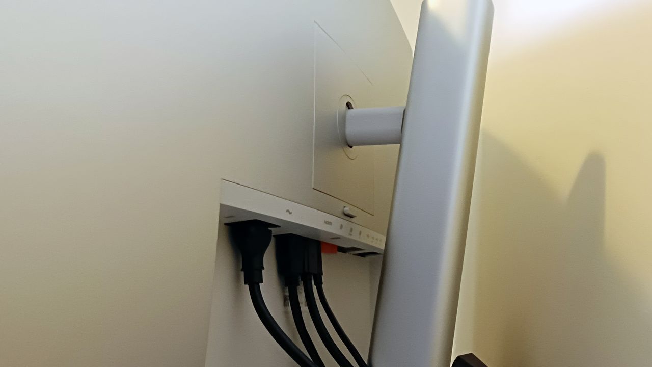 A Dell UltraSharp U3223QZ monitor sitting on a desk