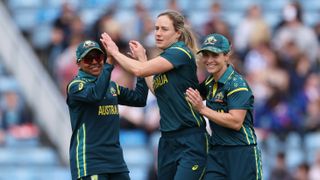 Ellyse Perry of Australia celebrates with teammates Sophie Molineux and Alana King