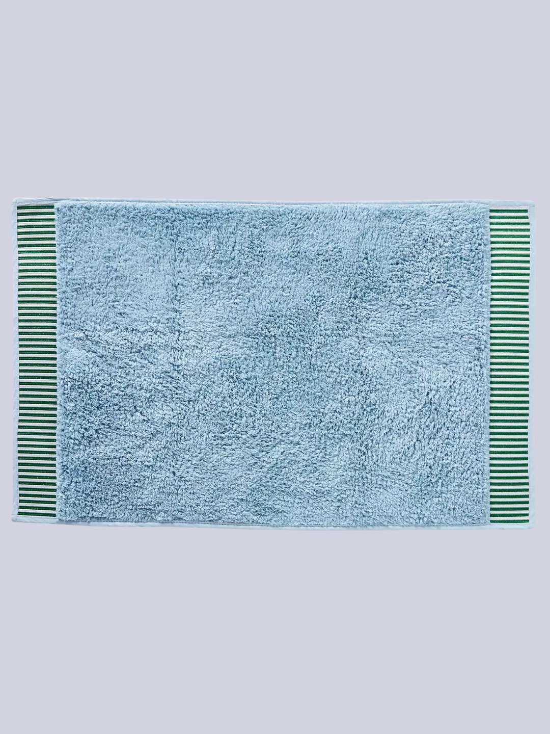 A blue and green bath mat
