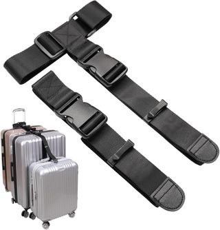 A black Vigorport luggage strap connects three suitcases together