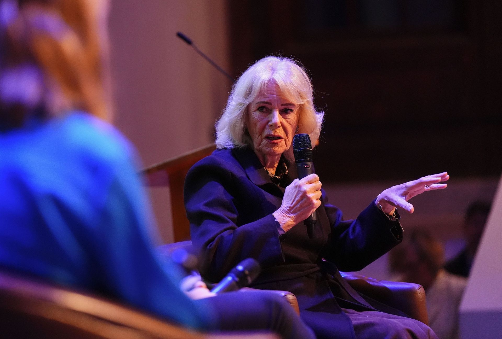 Queen Camilla speaks on stage during a panel discussion at the Ending Violence Against Women and Girls Summit, at Marlborough College on October 23, 2026