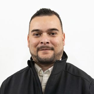 Smiling headshot of Juan Segovia.