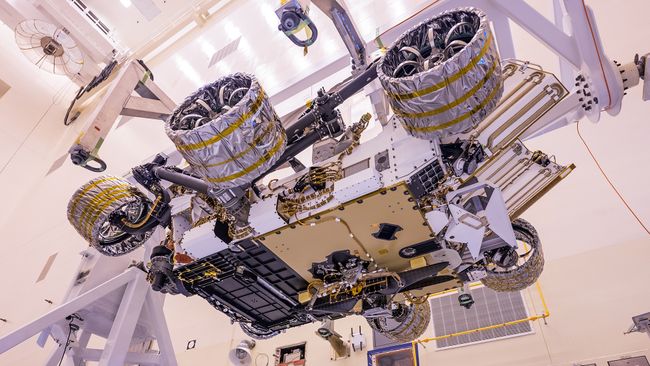 Ingenuity is tucked under the belly of the Perseverance rover.