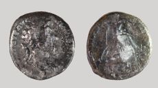 The front and back of a silver coin from the Roman Empire. 