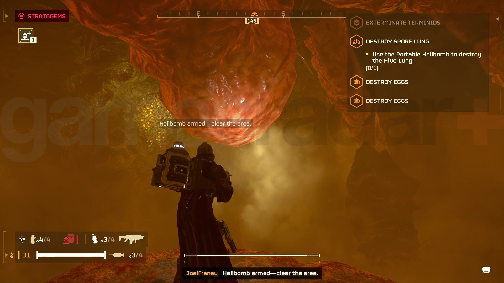A player arms and activates a Portable Hellbomb in Helldivers 2