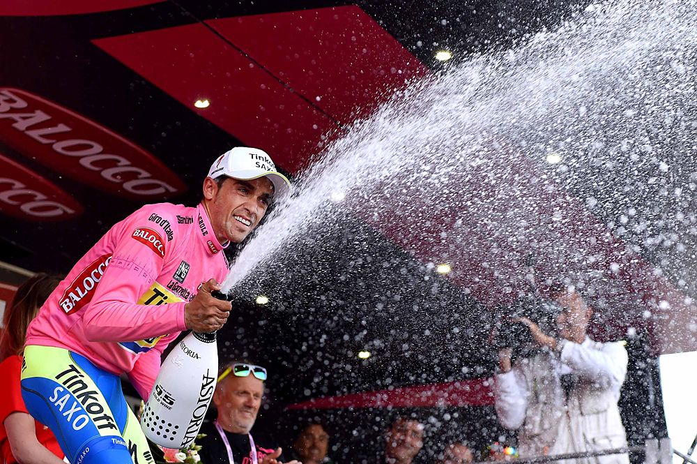 Alberto Contador (Tinkoff-Saxo) celebrates his overall race lead on the stage 5 podium