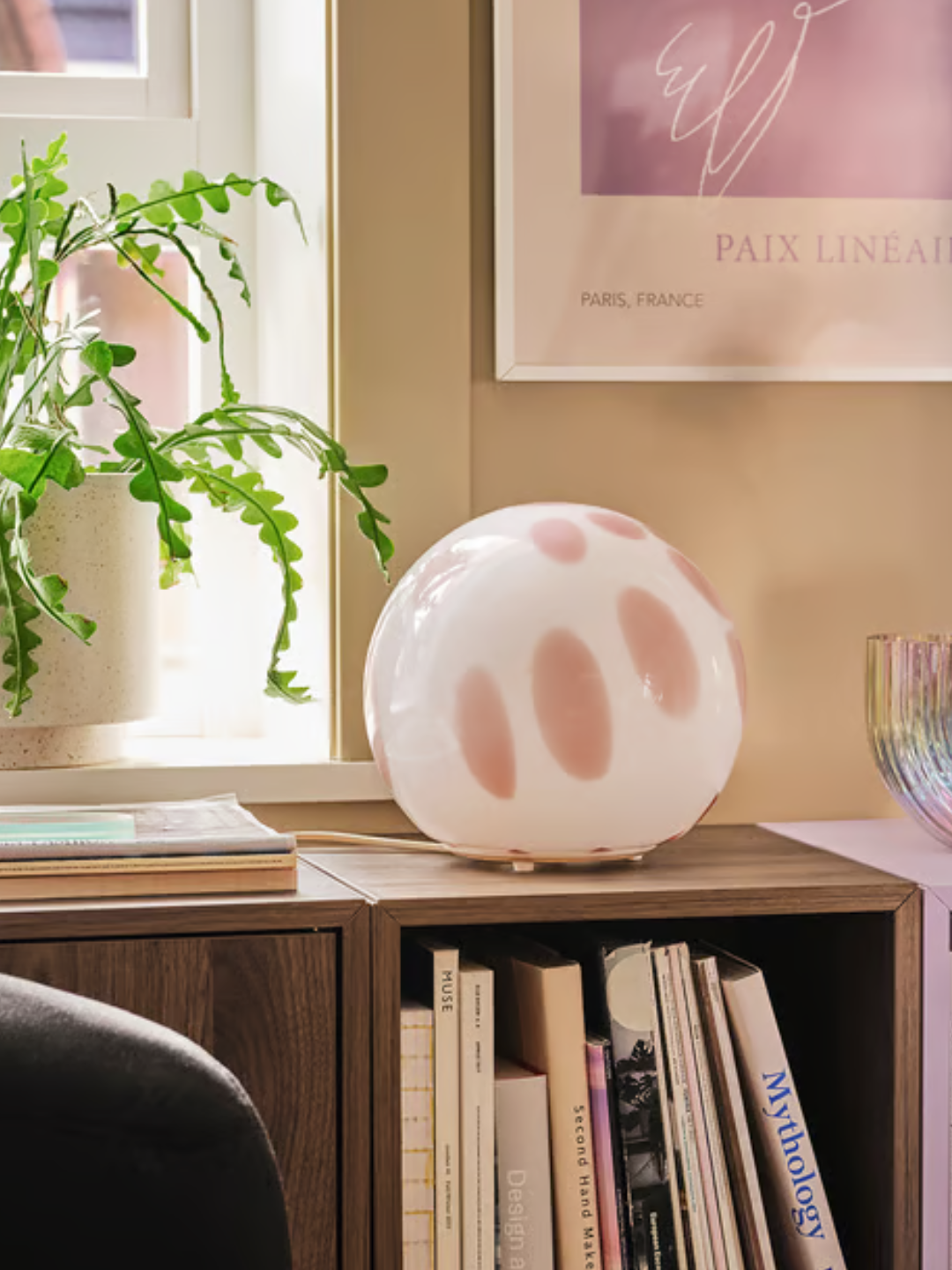 A pink speckled white orb lamp from IKEA