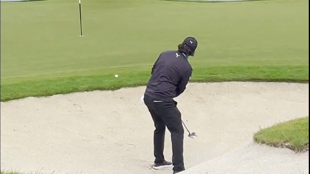 WATCH: Tour Pro Putts From Bunker... And Holes It!