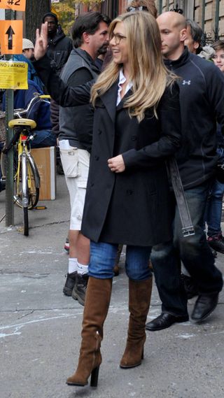 Jennifer Aniston wearing peacoat and knee high boots in New York, 2010