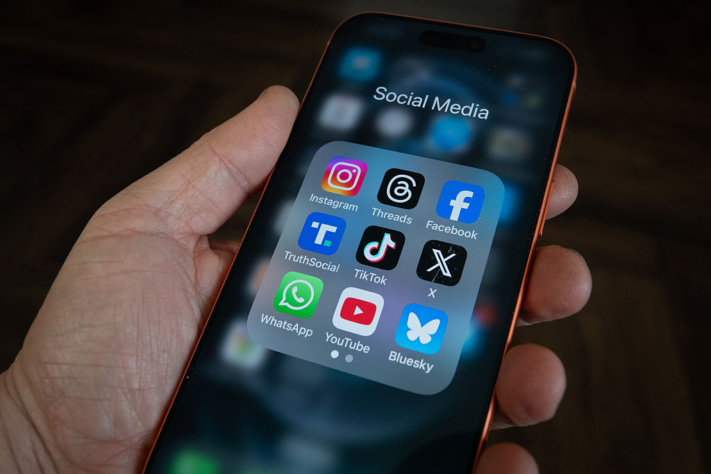  On top row left to right, the logo of social media platform Instagram is seen beside that of Meta&rsquo;s Threads and Facebook. On the middle row from left is the logo of Donald Trump&amp;apos;s Truth Social app, next to the logo of social media app TikTok and the logo of Elon Musk&rsquo;s US online social media and social networking site &amp;apos;X&amp;apos; (formerly known as Twitter). Along the bottom row, left to right is the messaging service WhatsApp, the logo for online video sharing and social media platform YouTube and the logo for the Bluesky app. (Photo by Anna Barclay/Getty Images)