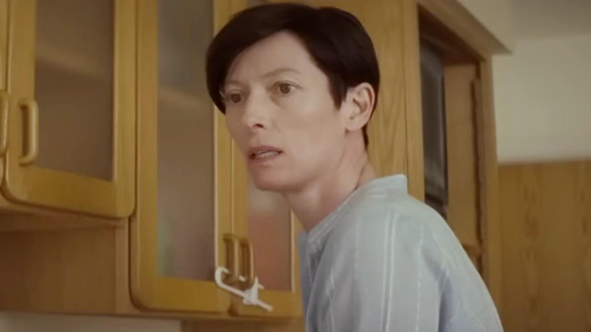 Tilda Swinton looking off to the side in We Need to Talk About Kevin