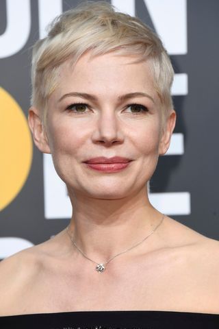 Michelle Williams has a wispy, blonde pixie cut whilst attending The 75th Annual Golden Globe Awards at The Beverly Hilton Hotel on January 7, 2018 in Beverly Hills, California.