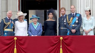 Meghan Harry Lilibet jubilee Prince Charles, Prince of Wales, Camilla, Duchess of Cornwall, Queen Elizabeth II, Meghan, Duchess of Sussex, Prince Harry, Duke of Sussex, Prince William, Duke of Cambridge and Catherine, Duchess of Cambridge watch the RAF flypast on the balcony of Buckingham Palace, as members of the Royal Family attend events to mark the centenary of the RAF on July 10, 2018 in London, England