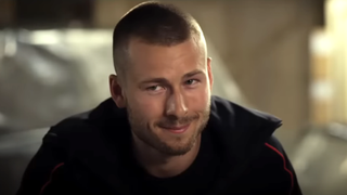 Glen Powell smiling in The Expendables 3
