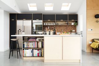 kitchen with black nd plywood finish by plykea