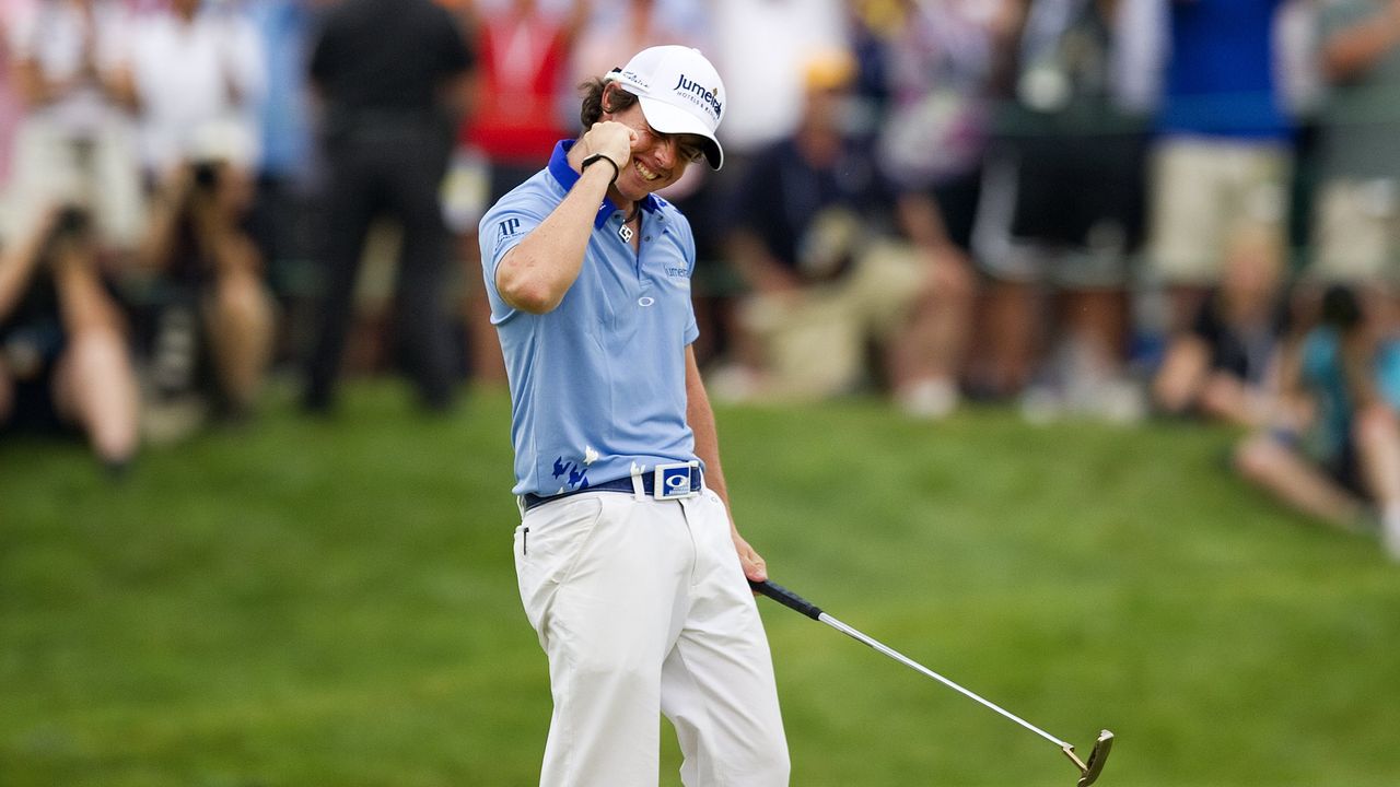 Rory McIlroy celebrates his eight-shot victory in the 2011 US Open