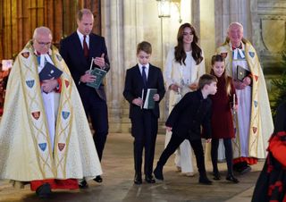 Prince Louis blows out Princess Charlotte's candle