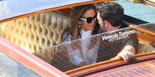 Jennifer Lopez and Ben Affleck share an intimate moment on a boat in Venice