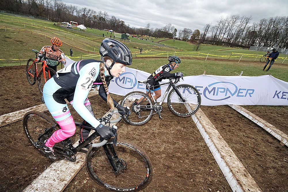 Riders demonstrate all methods of climbing the steps as they move through the course: Ride, Push, Carry.