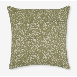 green block print pillow in a botanical pattern