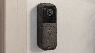 Blink Doorbell on wall with raindrops