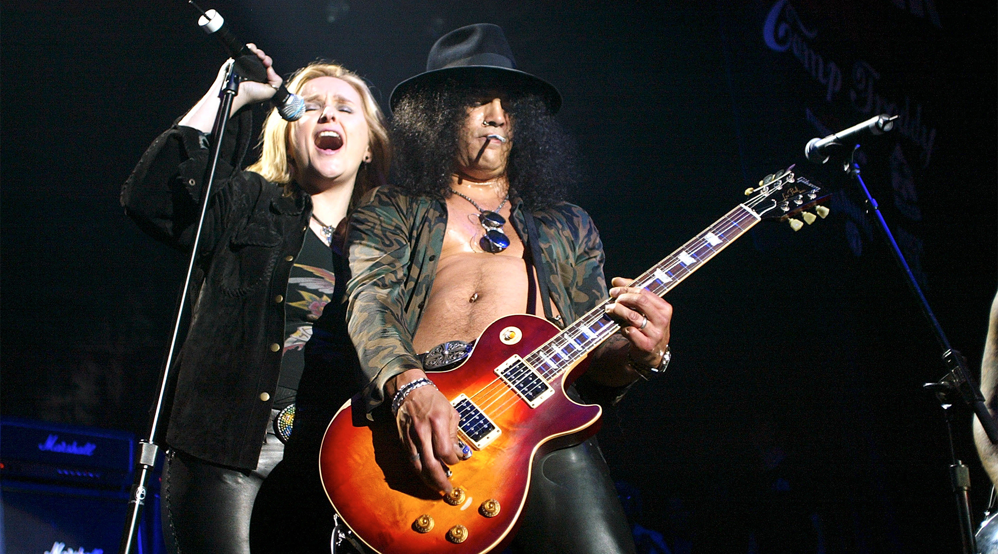 Singer Melissa Etheridge and guitarist Slash of Guns &amp;amp; Roses perform with Camp Freddy during the 2003 Blender Rock the Vote Awards after-party at the Roseland Ballroom February 22, 2003 in New York City.