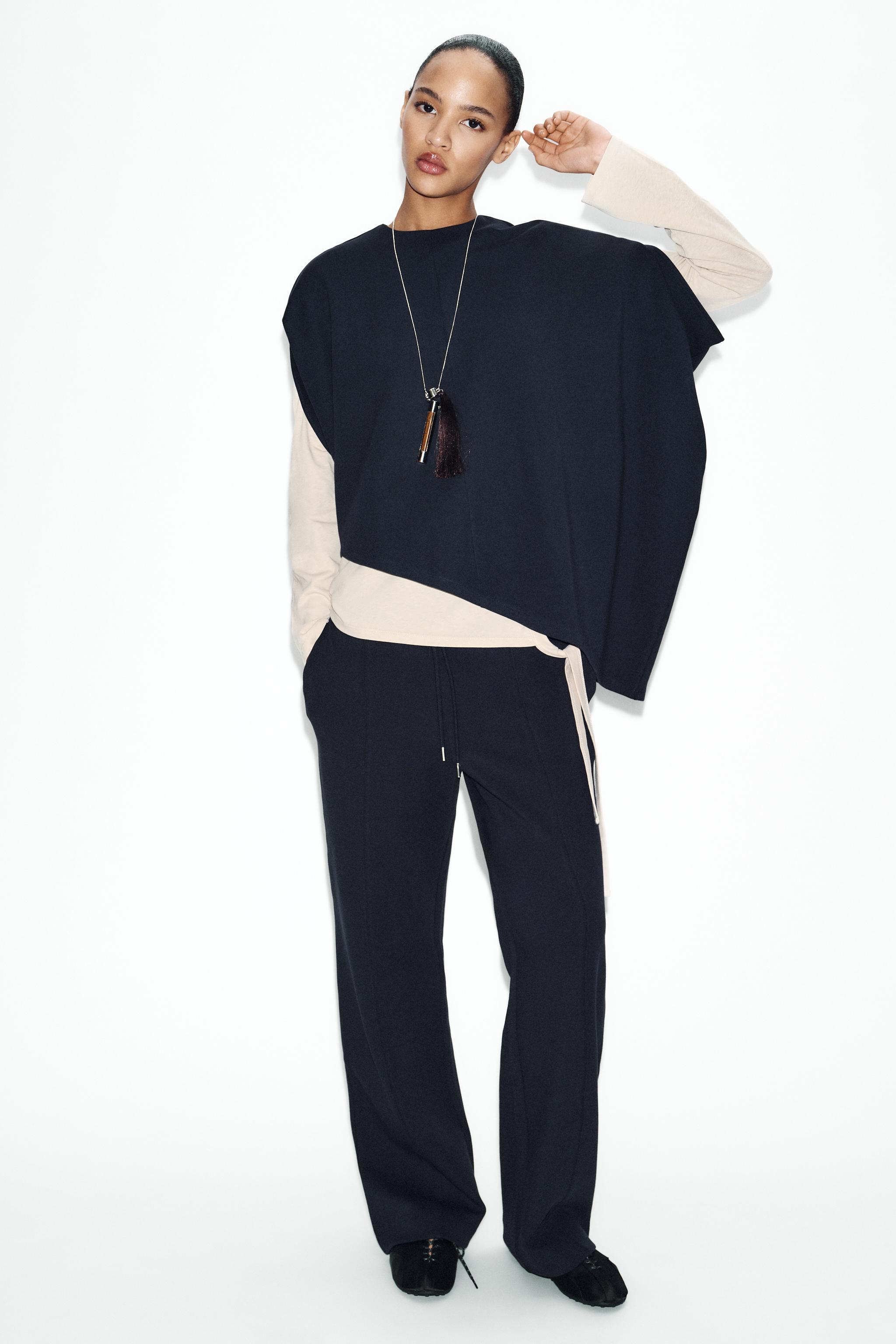 Asymmetric Interlock Cape