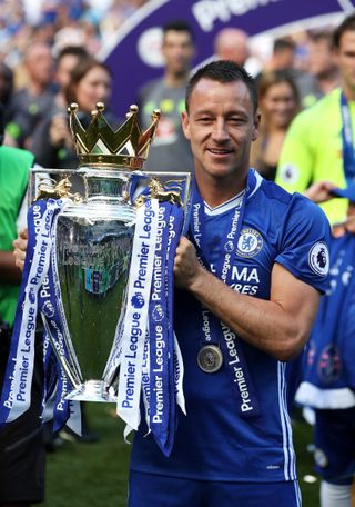 Chelsea’s John Terry celebrates with the Premier League trophy