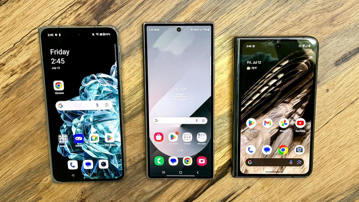 OnePlus Open vs Galaxy Z Fold 6 vs Pixel Fold on a table showing cover display