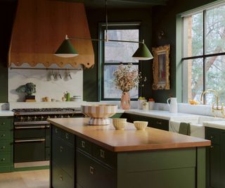 green eclectic cottage vintage style kitchen from the anthropologie spring 2025 lookbook