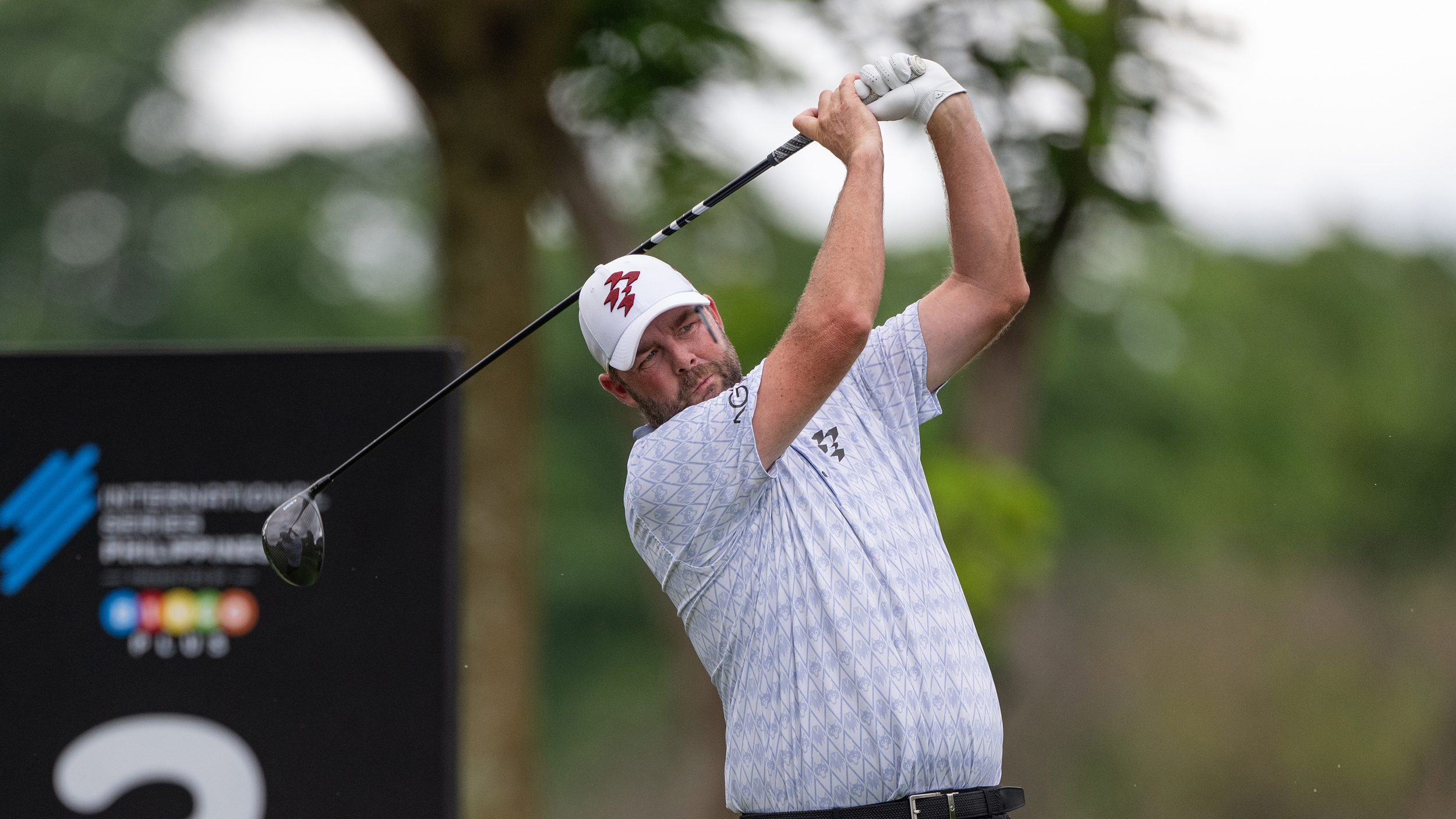 Marc Leishman hits a drive during the final round of the 2025 International Series Philippines