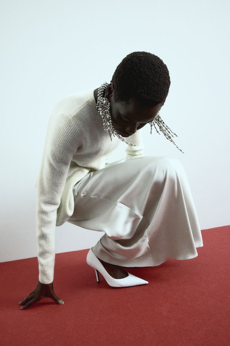 Rib-knit peplum jumper