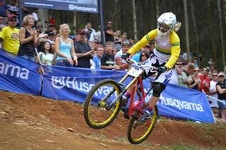 Tracey Hannah flies into the finish to complete her emphatic win in the women's division