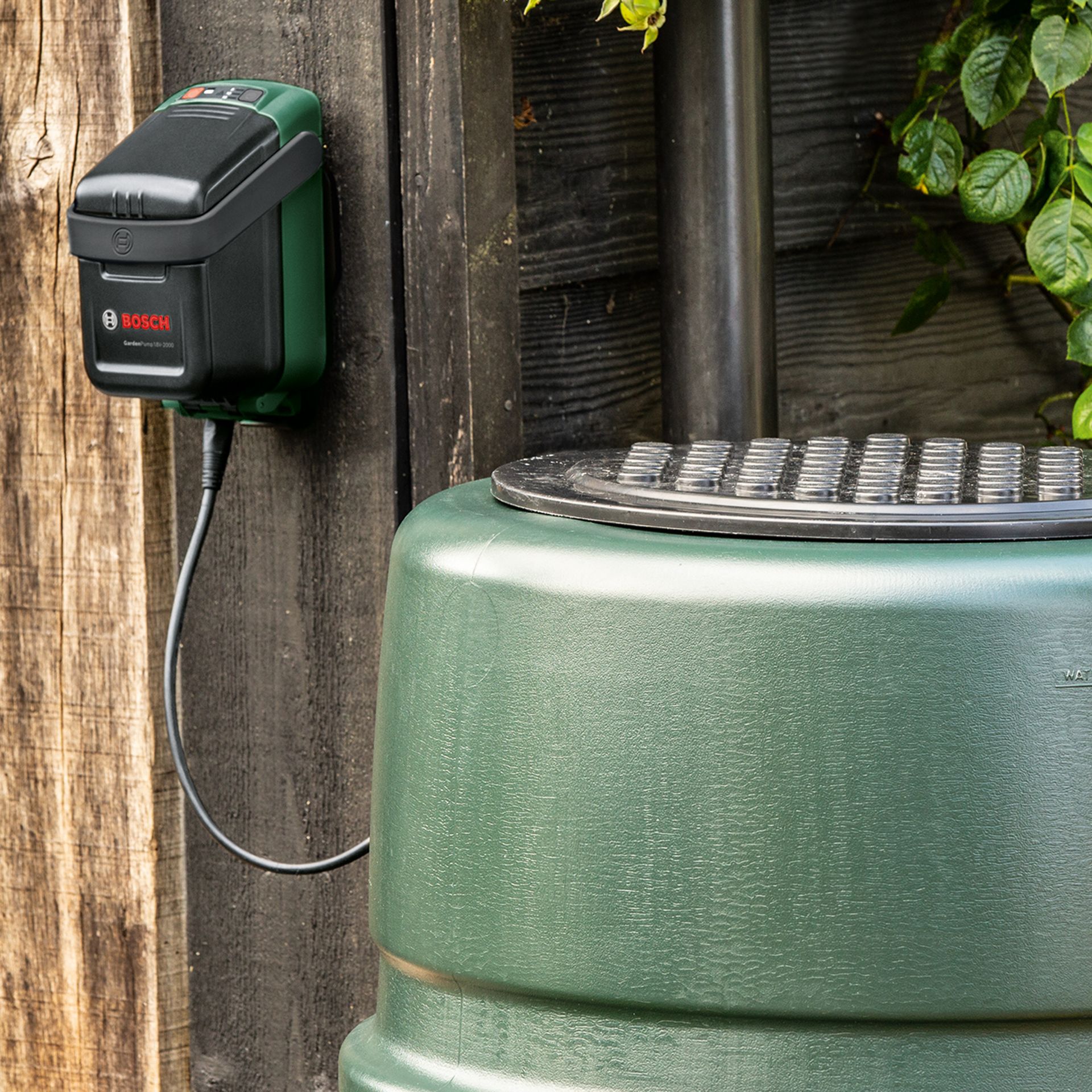 Bosch garden pump next to water butt
