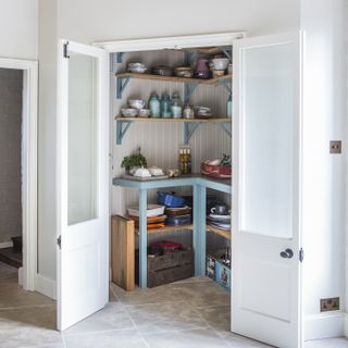 corner larder room with open shelving