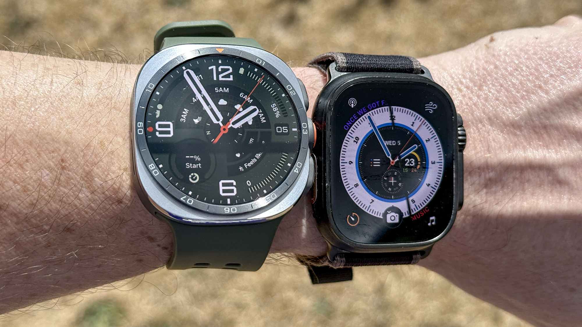 The Samsung Galaxy Watch Ultra 2 and Apple Watch Ultra 2 on a wrist outside