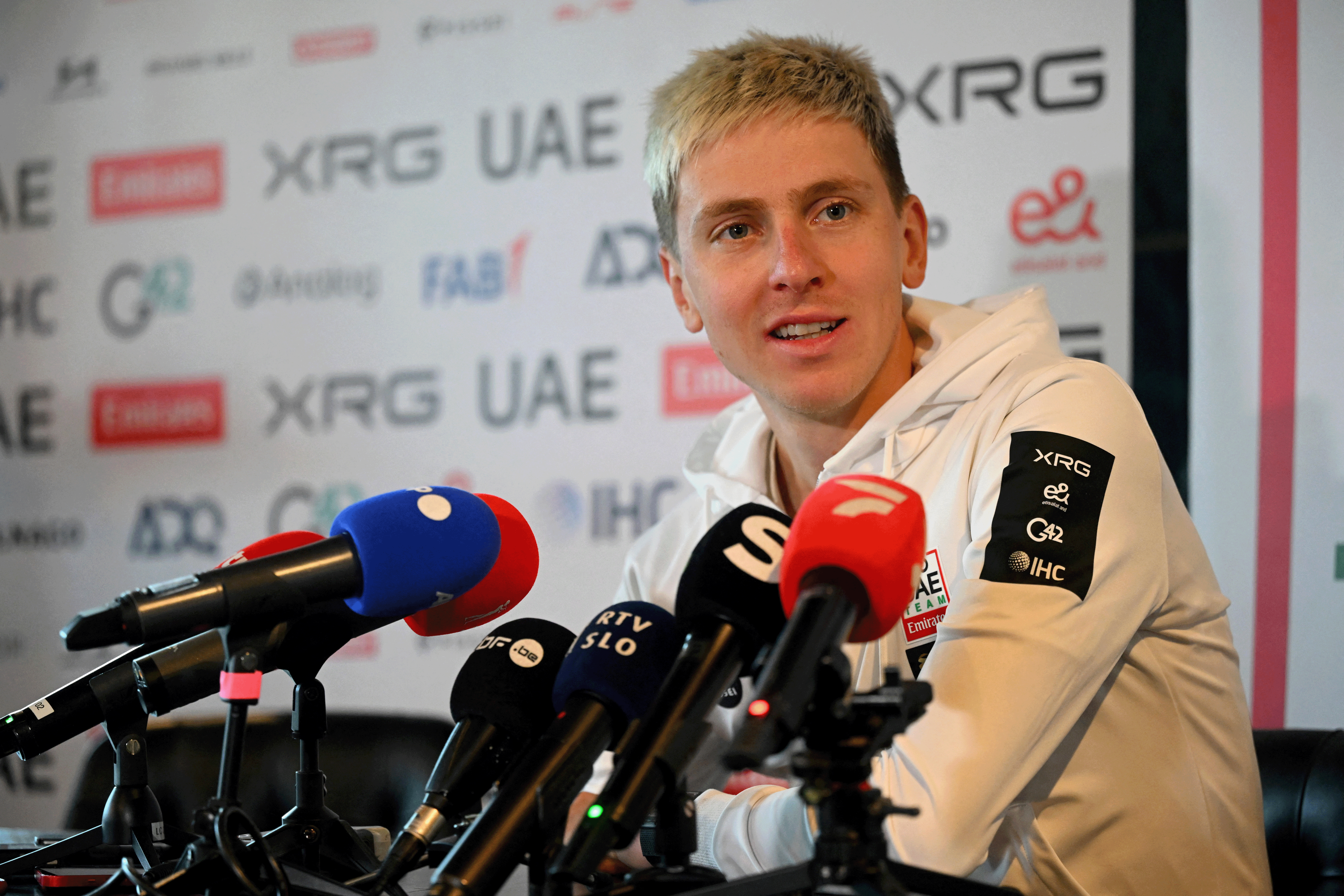 UAE Emirates-XRG's Slovenian rider Tadej Pogacar speaks to journalists during a press conference ahead of the 110th edition of Tour of Flanders, one-day cycling race in Waregem on April 3, 2026. (Photo by Nicolas TUCAT / AFP via Getty Images)