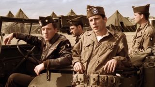 Liebgott and Winters sitting in a jeep listening to a German speak in Band of Brothers