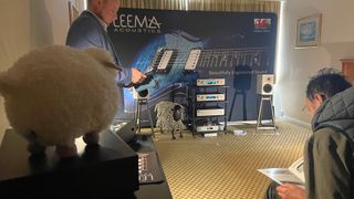 Leema Acoustics Quantum range on a rack with speakers