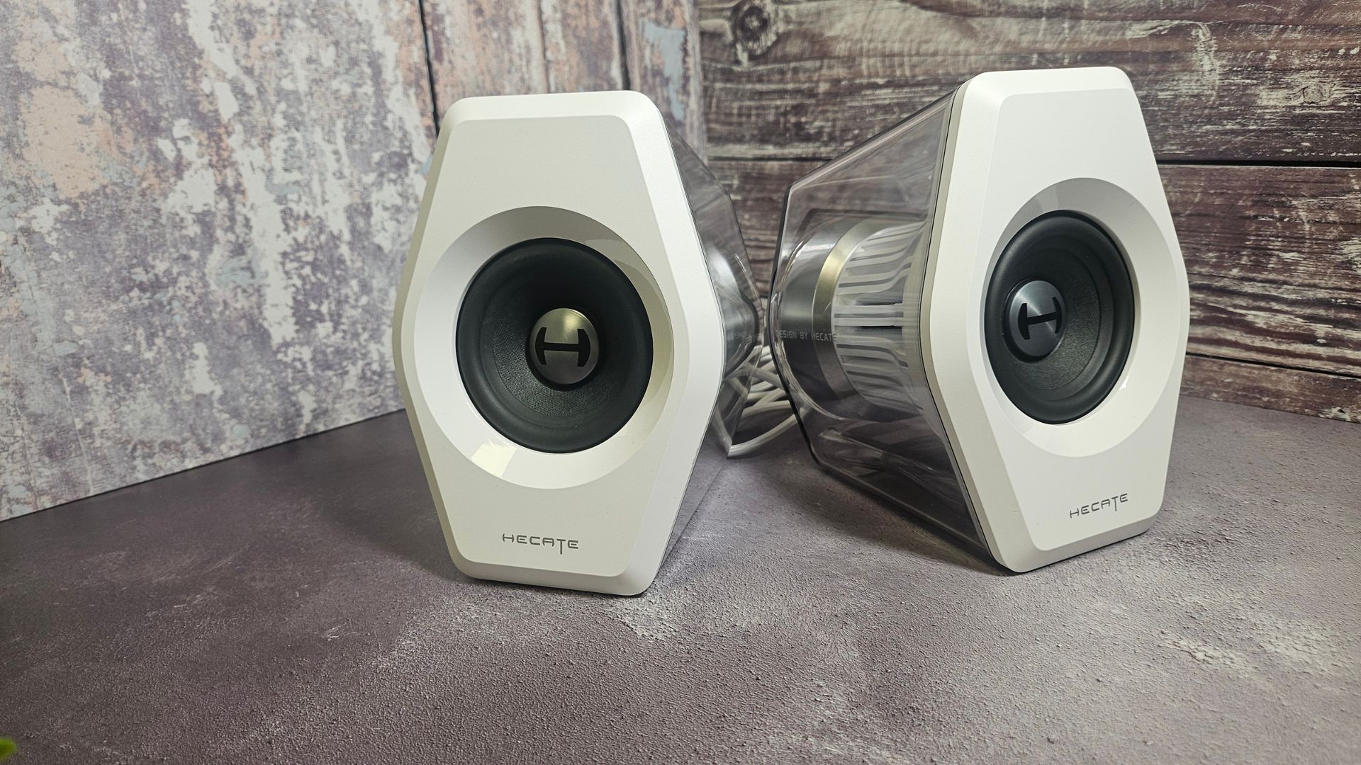 A pair of white Edifier G2000 Pro speakers