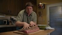 George Sr. massaging the brisket on Young Sheldon