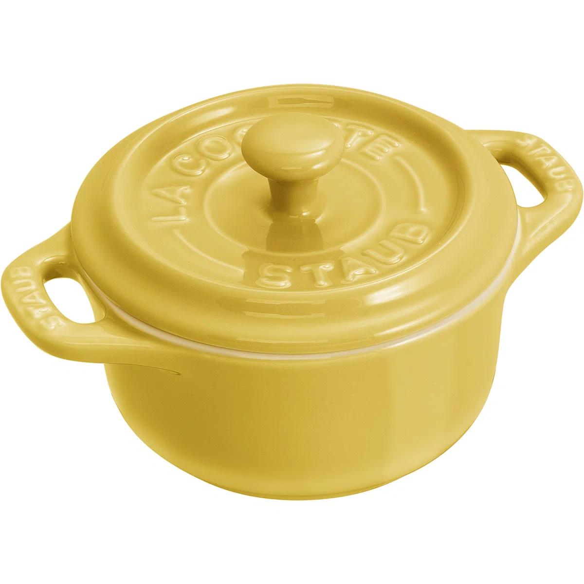 A small round yellow ramekin with a lid