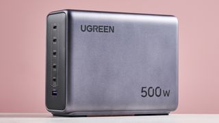 UGreen Nexode 500W 6-Port Charger against pink background