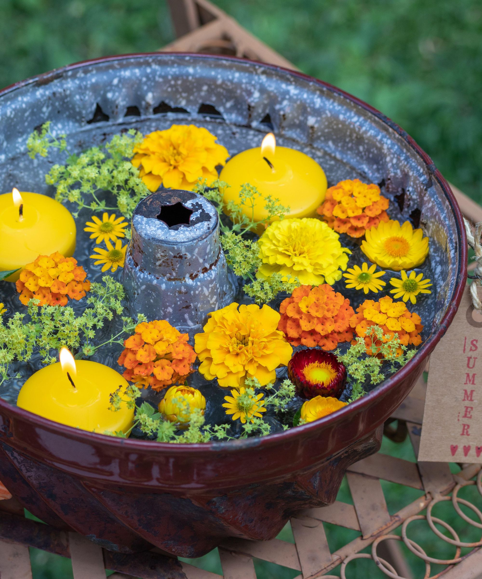 outdoor floating candles in old cake mould