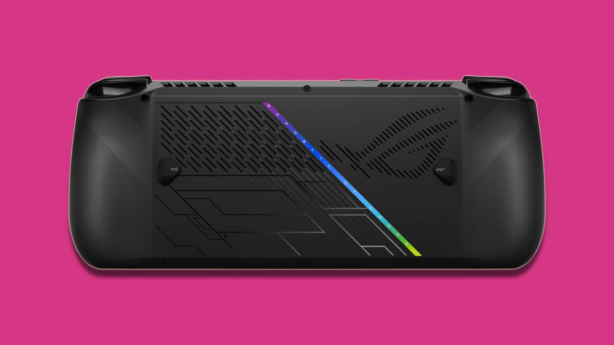 black PC gaming handheld against pink background
